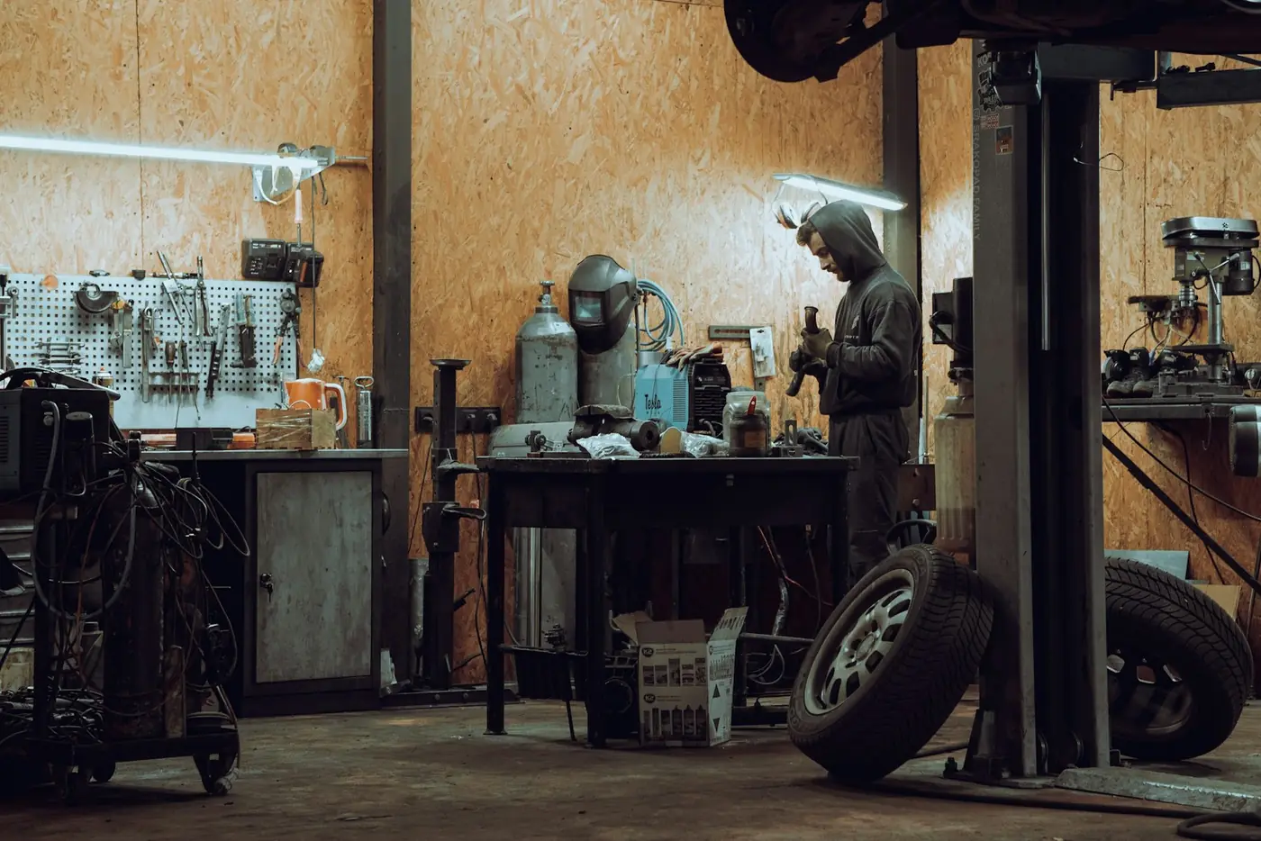 A technician at work in the bay